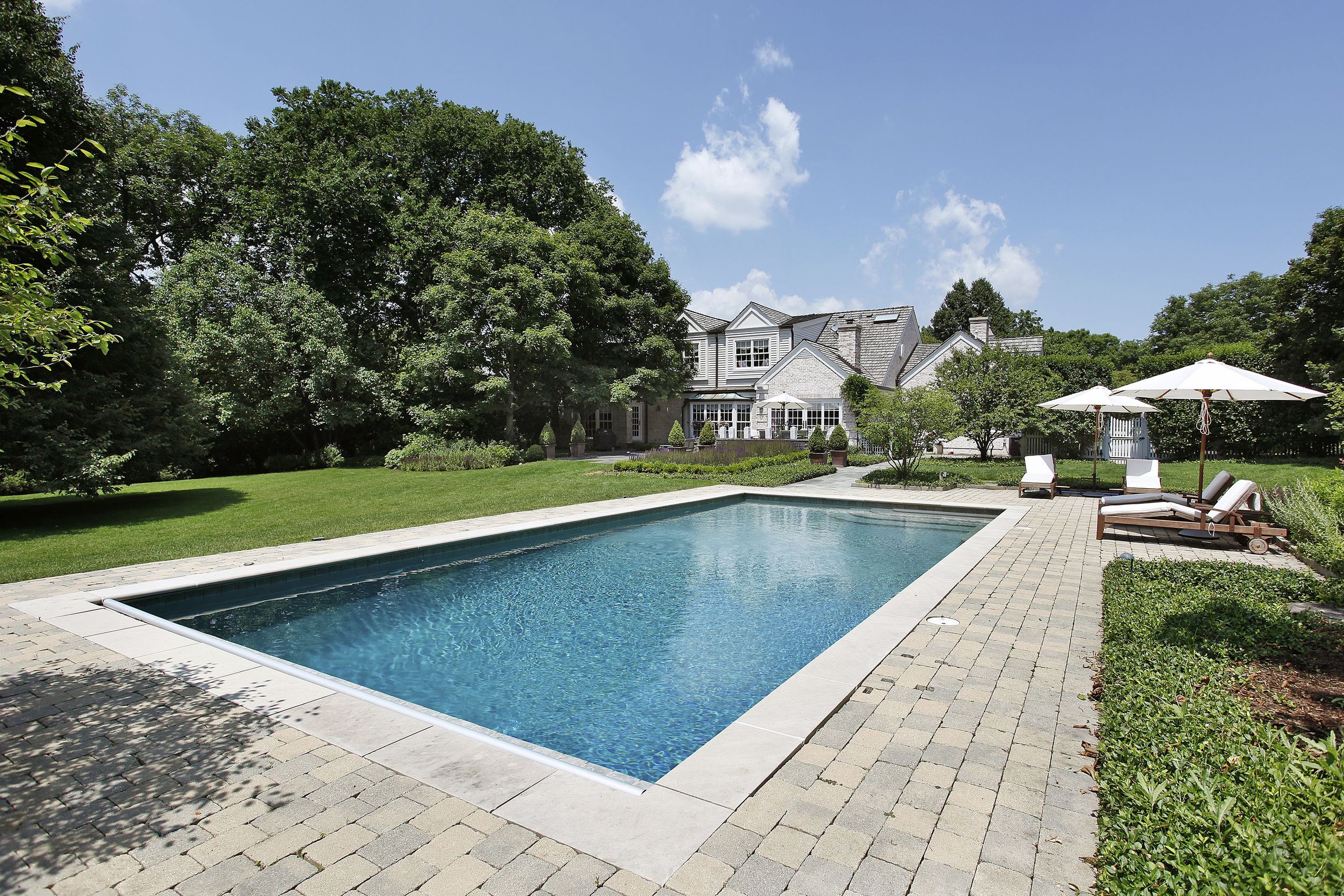 Lions Creek Fencing and Masonry Offers Modern Pool Patio Design in Madison CT